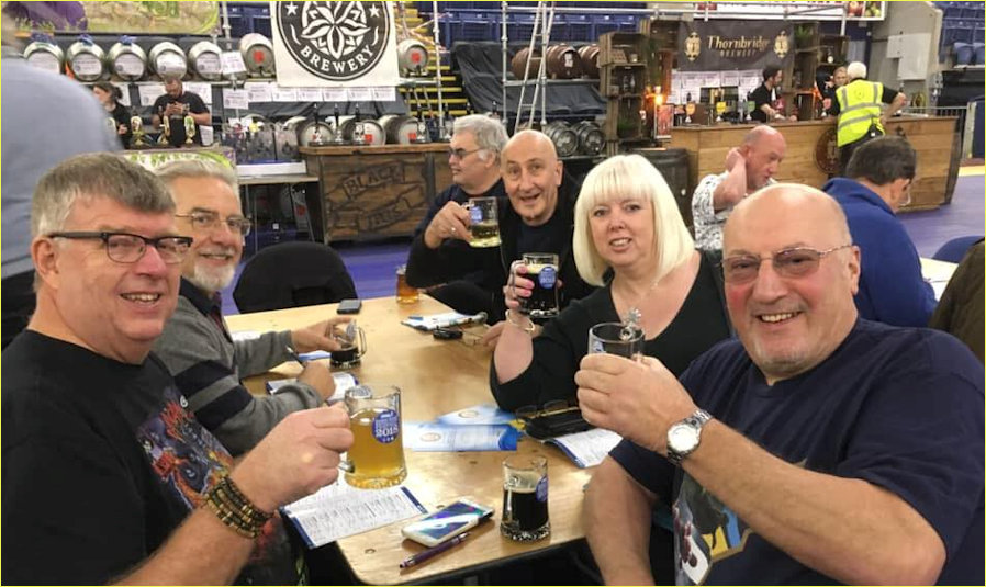 Louise Harrison and Friends raising a glass